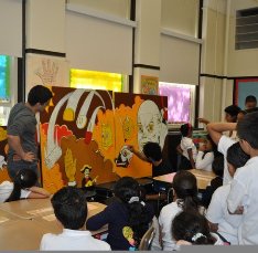 Conmocion mural, working with children